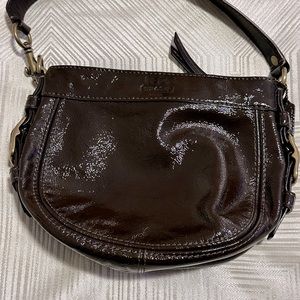 Coach Zoe Mini Chocolate Patent Leather! Pre-Owned in good condition.